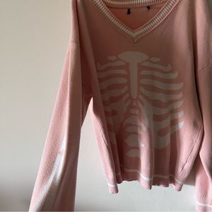 pink skeleton sweater